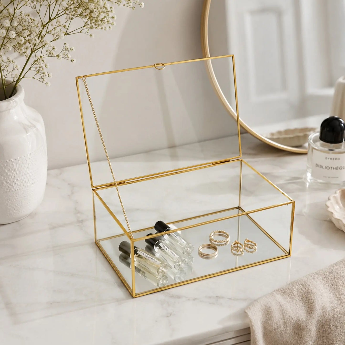 Keepsake Box displaying small decorative items and keepsakes with an elegant glass design