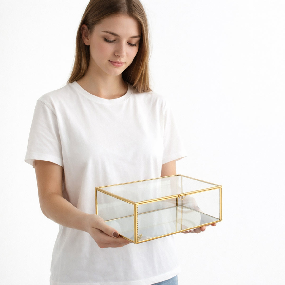 Elegant Gold Glass Makeup Organizer Box held in hand showcasing its transparent glass design