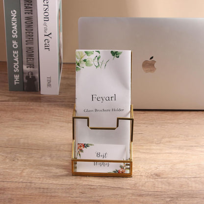 Gold edge glass pamphlet holder on office counter