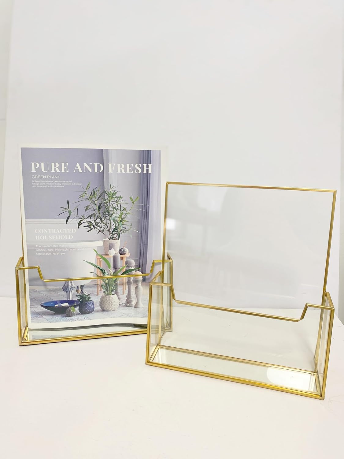 Elegant Glass Brochure Holder with sleek gold frame on a tabletop for versatile, stylish and durable display use