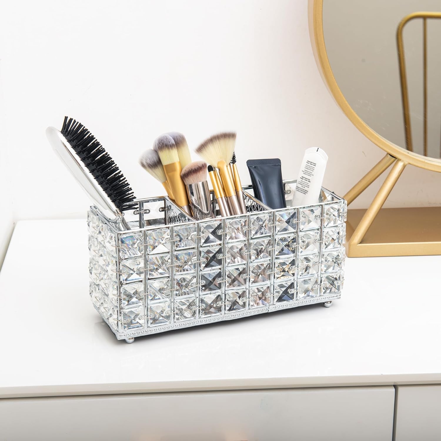 Crystal Makeup Brush Holder organizing scattered makeup brushes on a vanity table for easy access