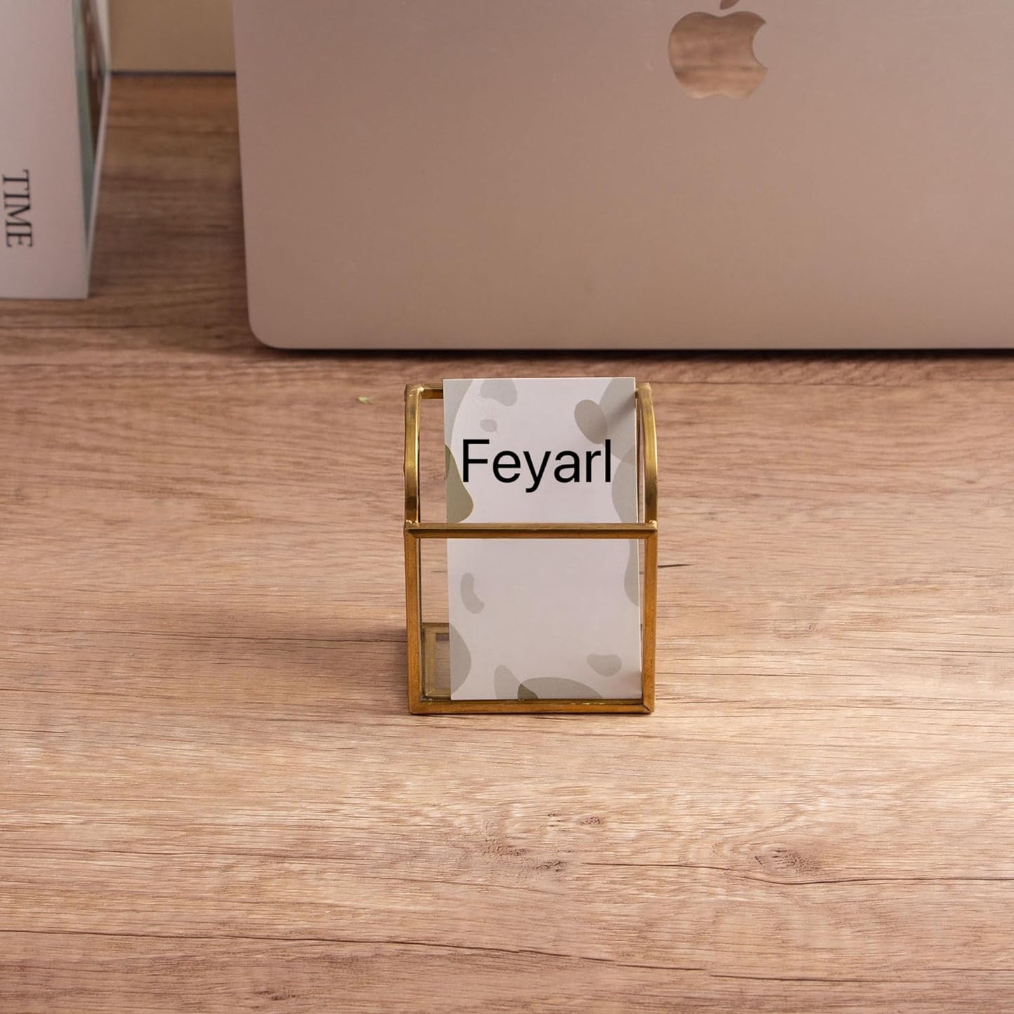 Clear Glass Business Card Holder with gold edge on a desk, adding a refined touch to the workspace