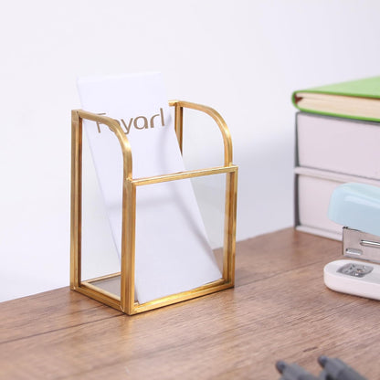 Clear Glass Business Card Holder with gold edge on a desktop, adding a refined touch to office organization
