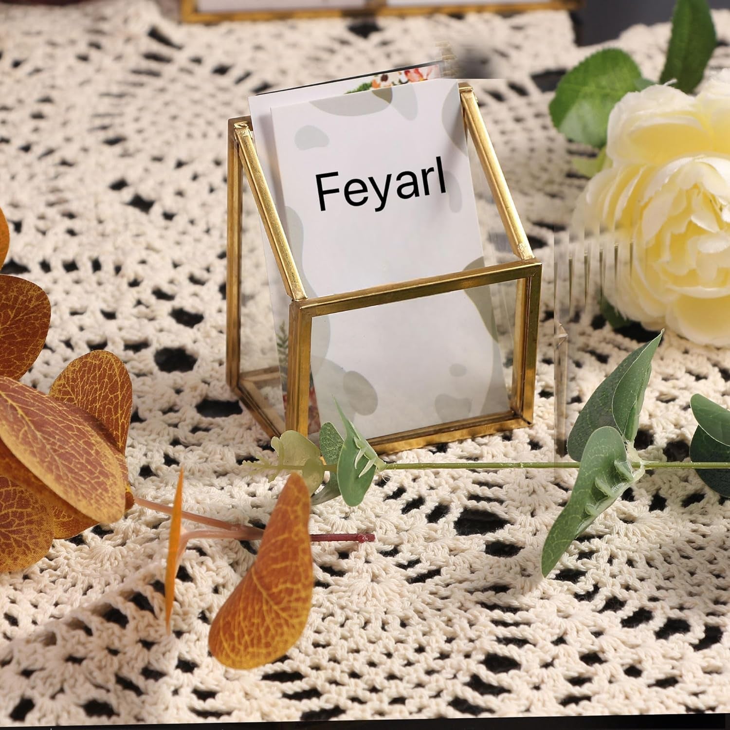 Clear Glass Business Card Holder with gold edge holding name cards for an elegant desktop display