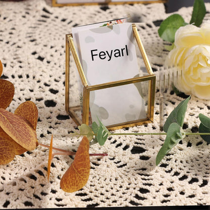 Clear Glass Business Card Holder with gold edge holding name cards for an elegant desktop display