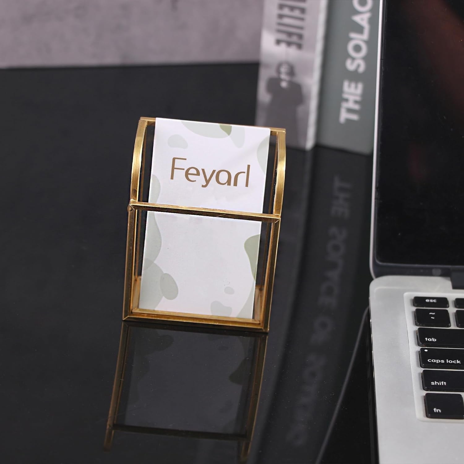 Premium Gold Glass Business Card Holder displayed on a desktop with a refined metallic texture and modern style