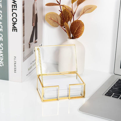 Elegant Clear Glass Business Card Holder with gold edge displaying business cards on a desktop workspace