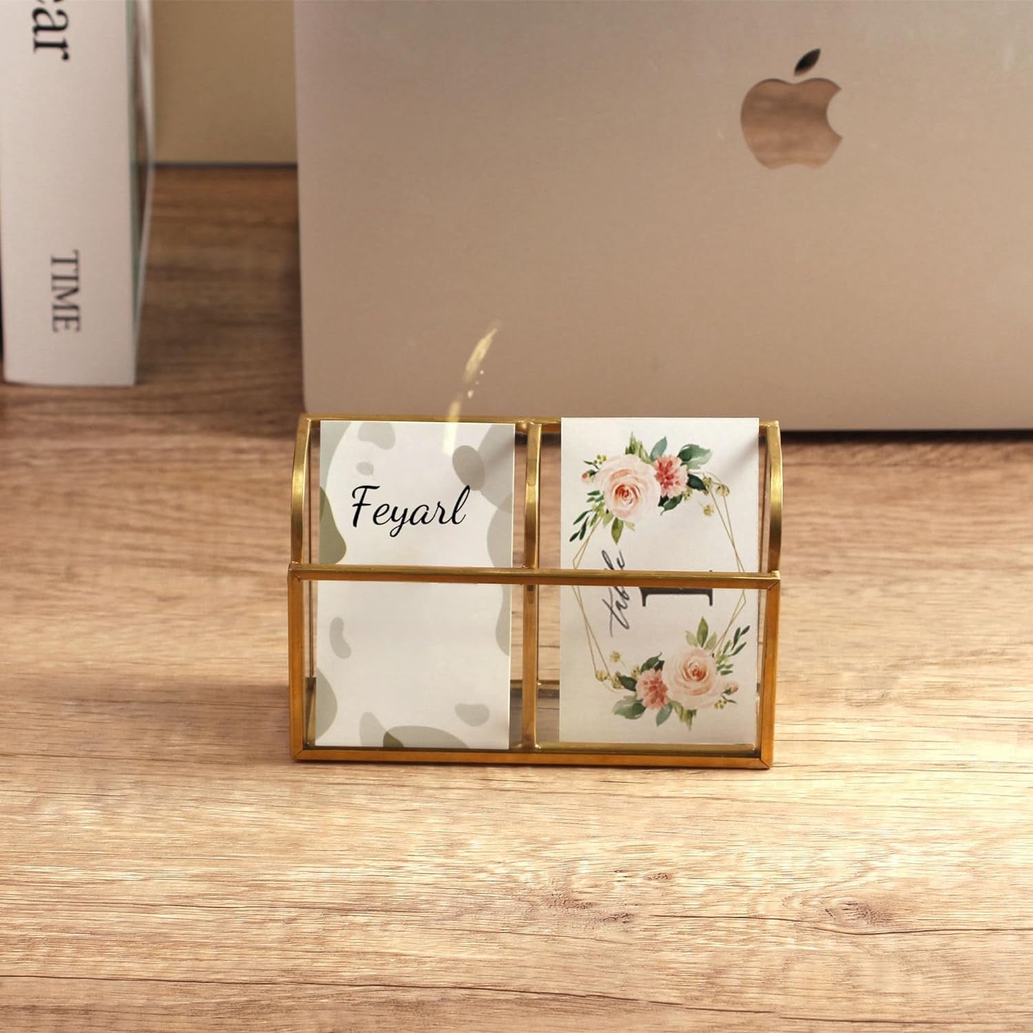 Glass Business Card Holder with gold edge displaying business cards on a desktop workspace