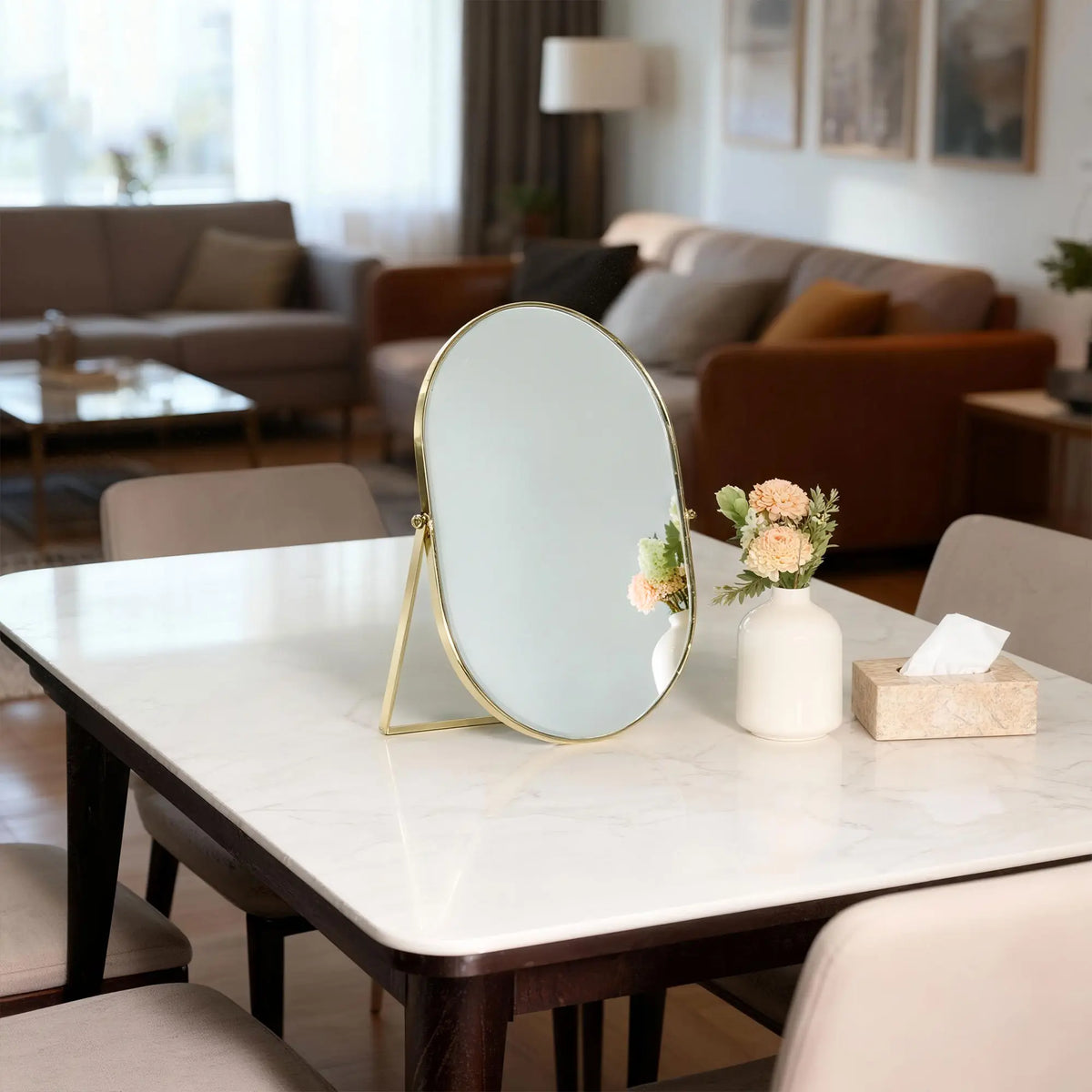 Vanity Mirror with Gold Metal Frame Placed on a Living Room Coffee Table for Elegant Home Décor Styling