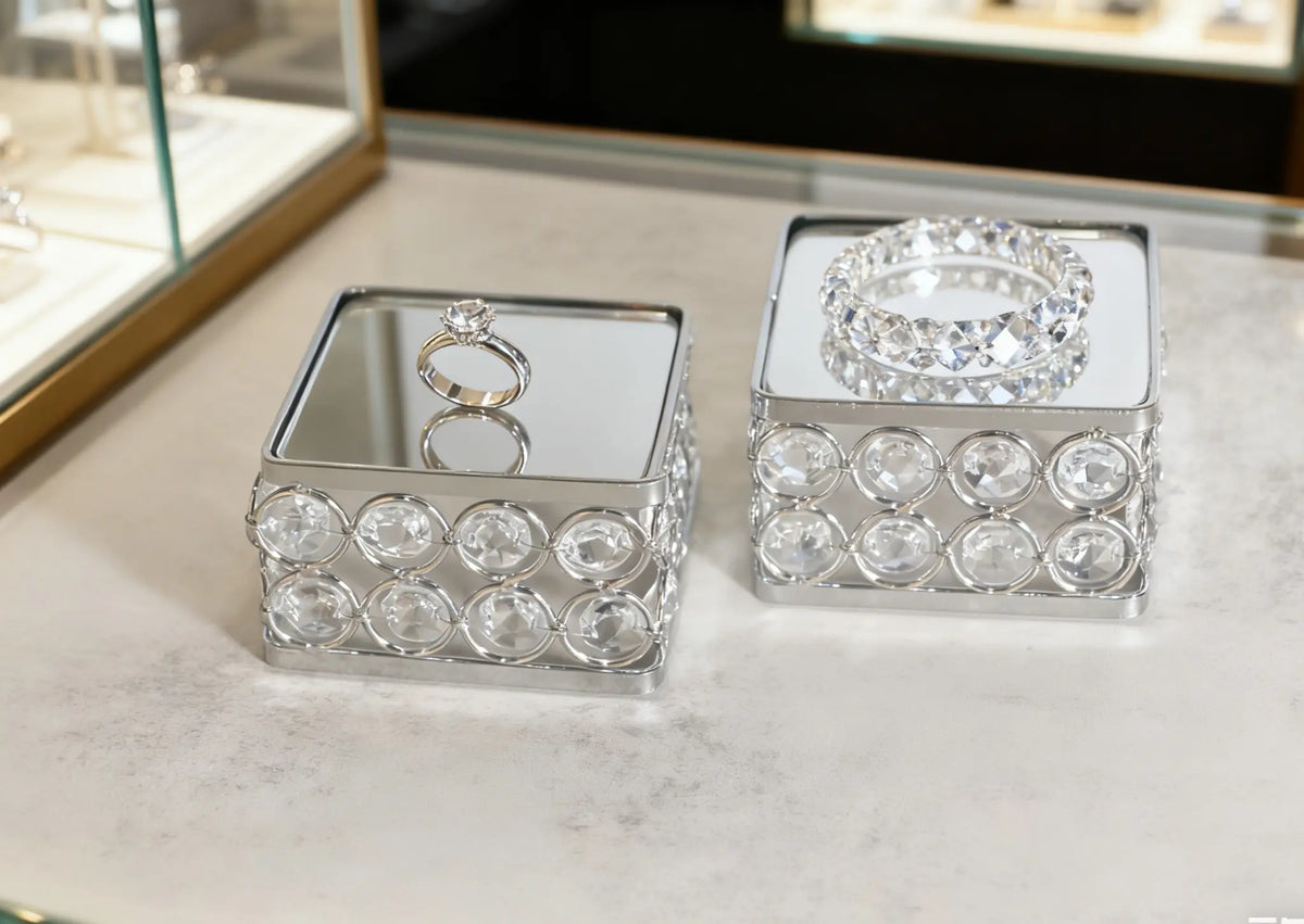 Display Stand with jewelry arranged on the mirrored surface for an elegant presentation