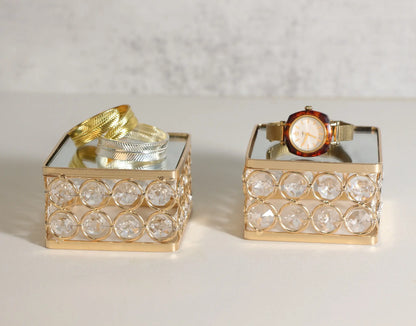 Feyarl Display Stand Set featuring a raised platform design with reflective mirror surfaces and crystal accents