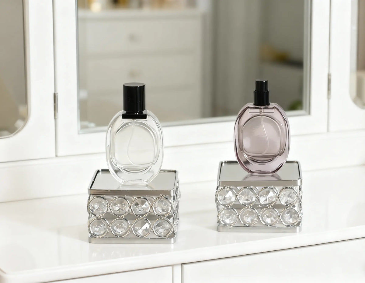 Feyarl Crystal Display Stand Set with two square risers featuring mirrored bases and sparkling crystal bead details