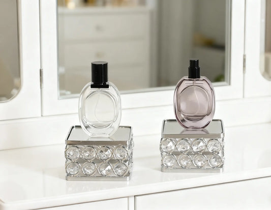 Feyarl Crystal Display Stand Set with two square risers featuring mirrored bases and sparkling crystal bead details