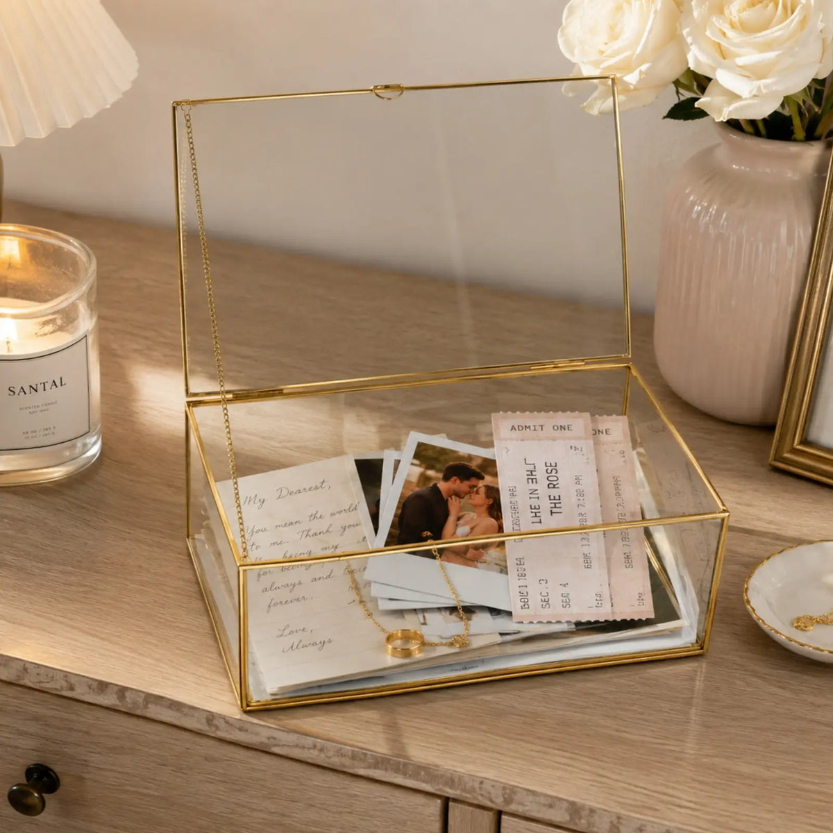 Glass Keepsake Box holding wedding photos and letters for a meaningful tabletop display