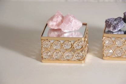 Crystal Display Pedestal holding crystal pieces with mirrored reflections and sparkling bead details