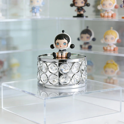 Silver Display Platform showcasing collectible figures with sparkling crystal details for an attractive display