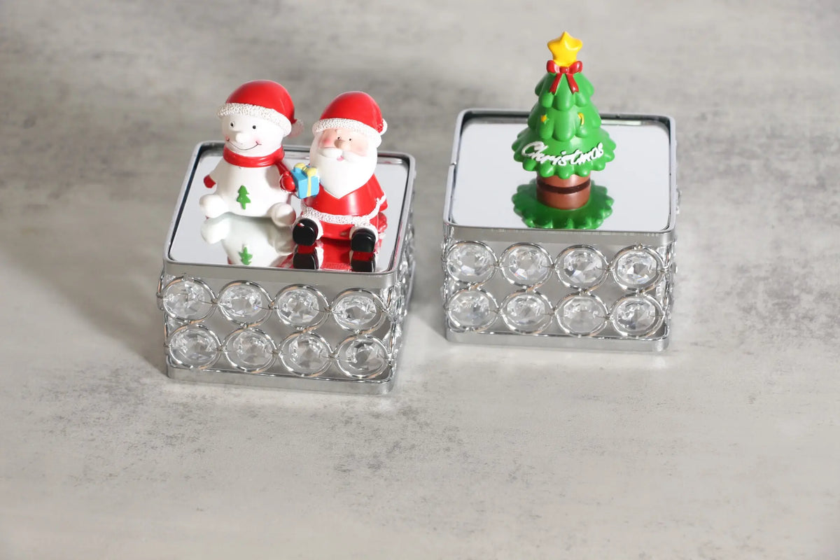 Elegant Silver Crystal Display Stand arranged with small ornaments