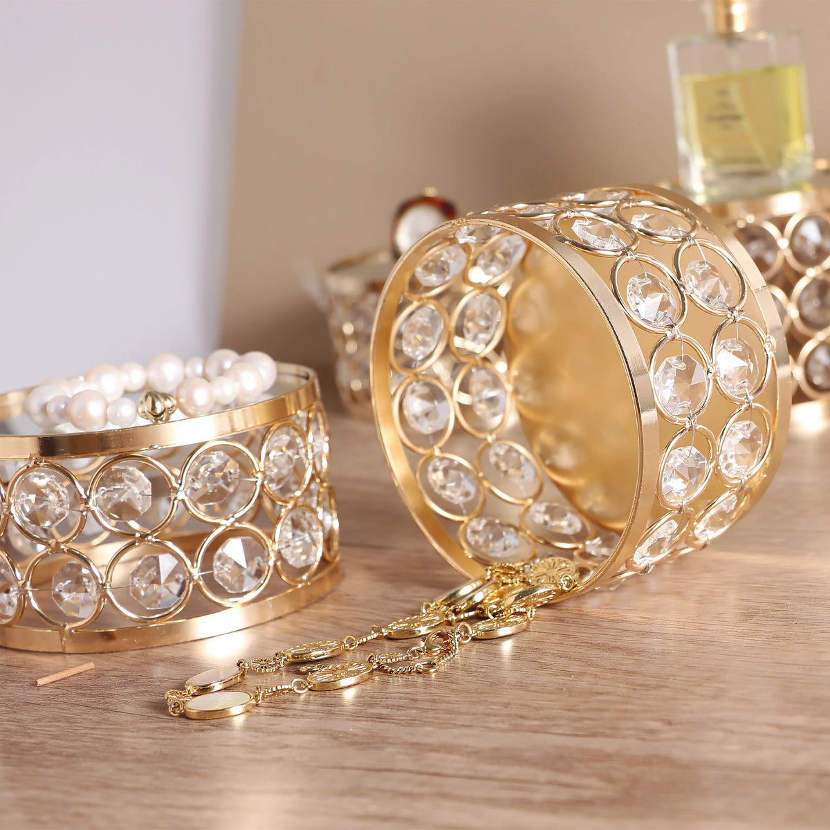 Elegant Gold Crystal Display Stand arranged with a necklace on a tabletop, adding a refined touch to home décor