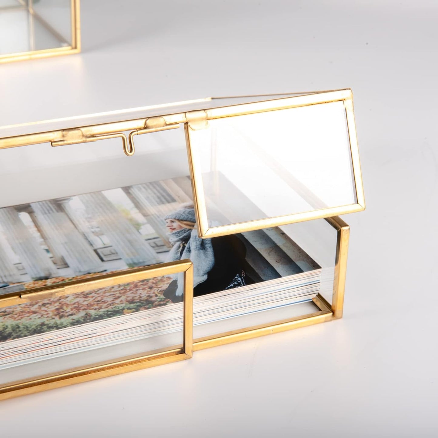 Gold Glass Keepsake Box showcasing the elegant lid detail and polished metal frame design