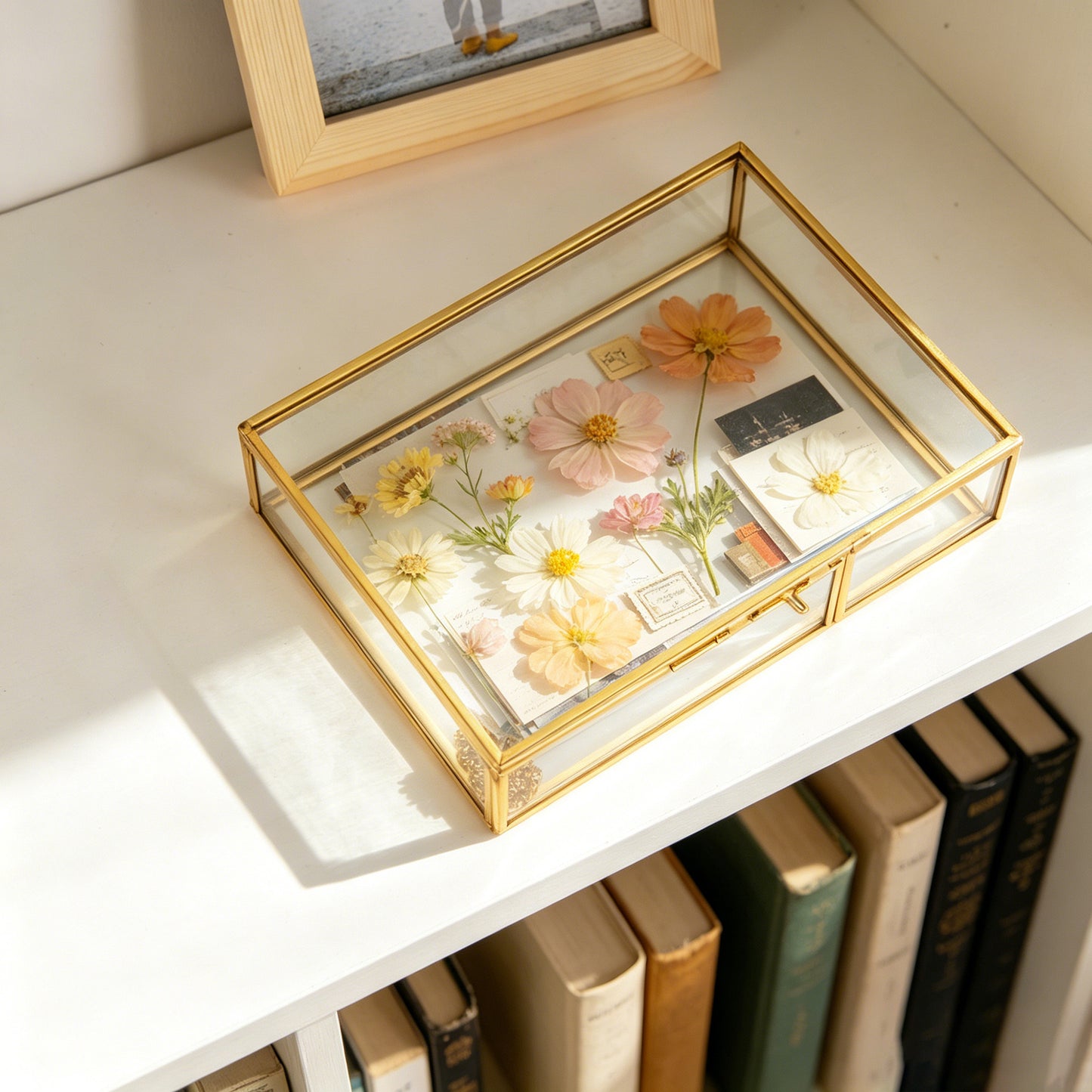Gold Glass Display Box featuring dried flowers as a decorative accent for an elegant home display