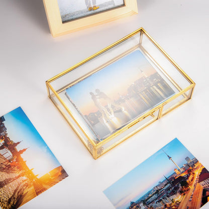 Glass Display Box holding photos on a tabletop with a dust-resistant design for preserving meaningful memories