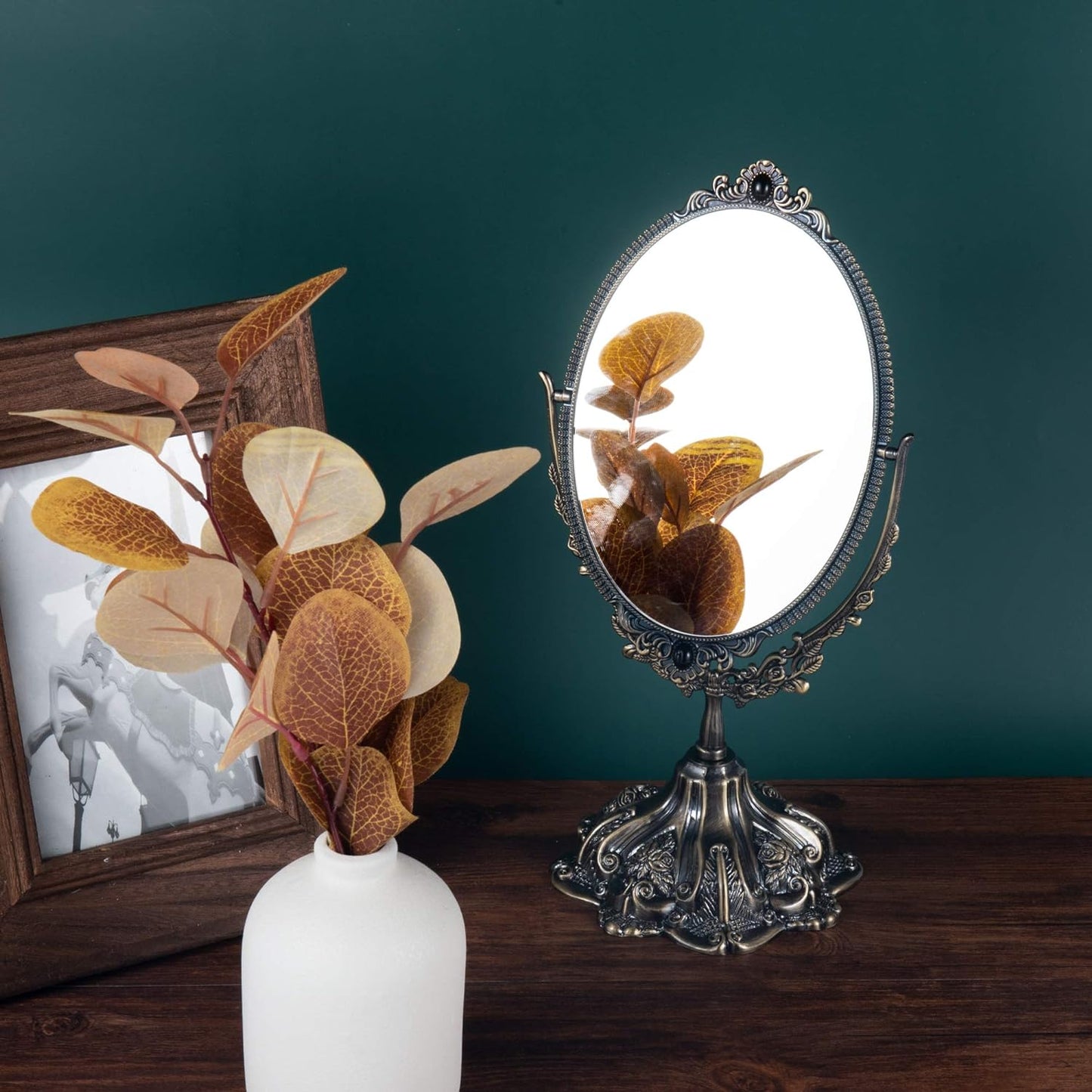 Compact Vintage Vanity Mirror displayed on a tabletop with an elegant floral frame design for refined home decor