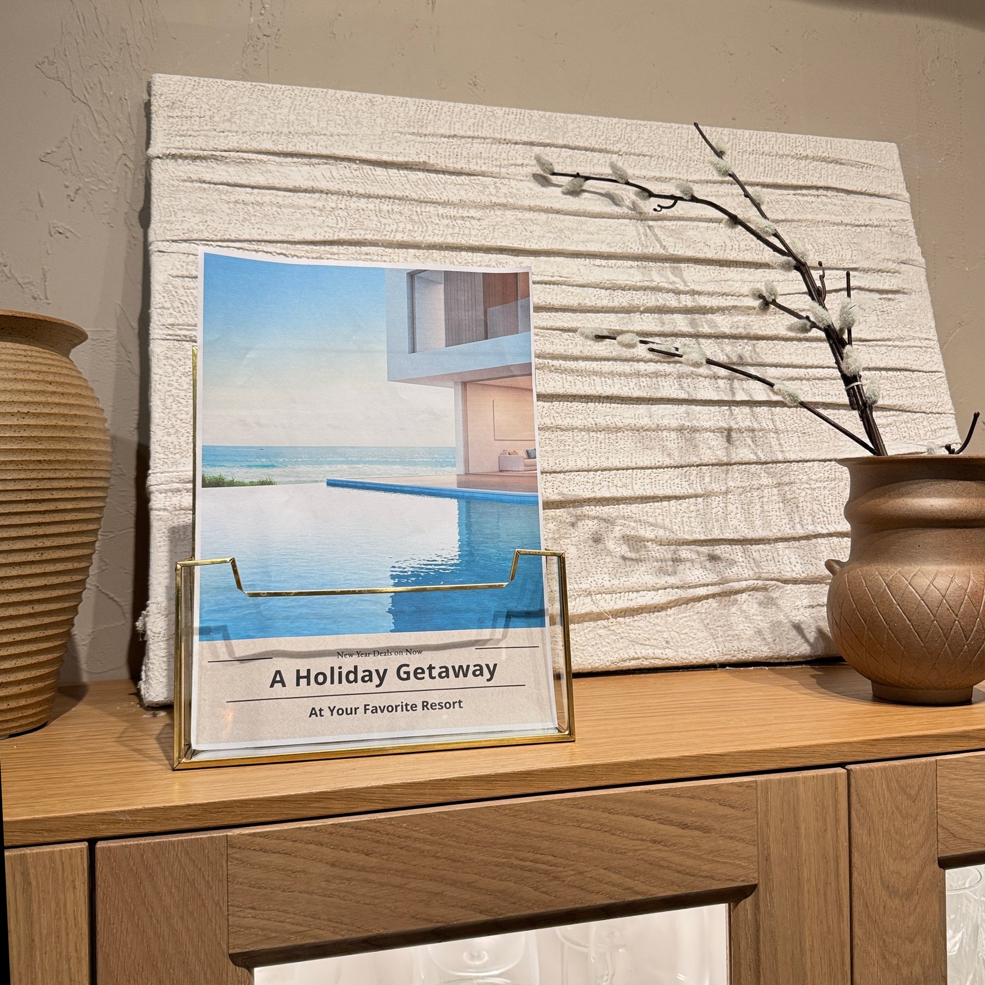 Gold Glass Brochure Holder with brochures displayed on a desk for organized literature presentation