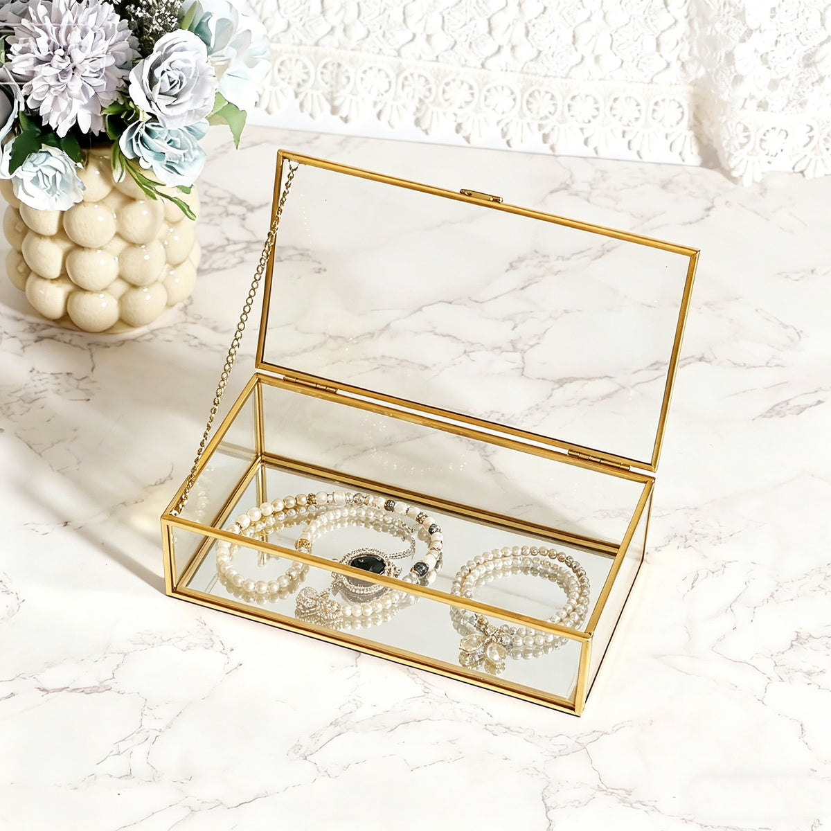 Jewelry Box with a Pearl Necklace Creates a Sophisticated Display While Keeping Accessories Tidy