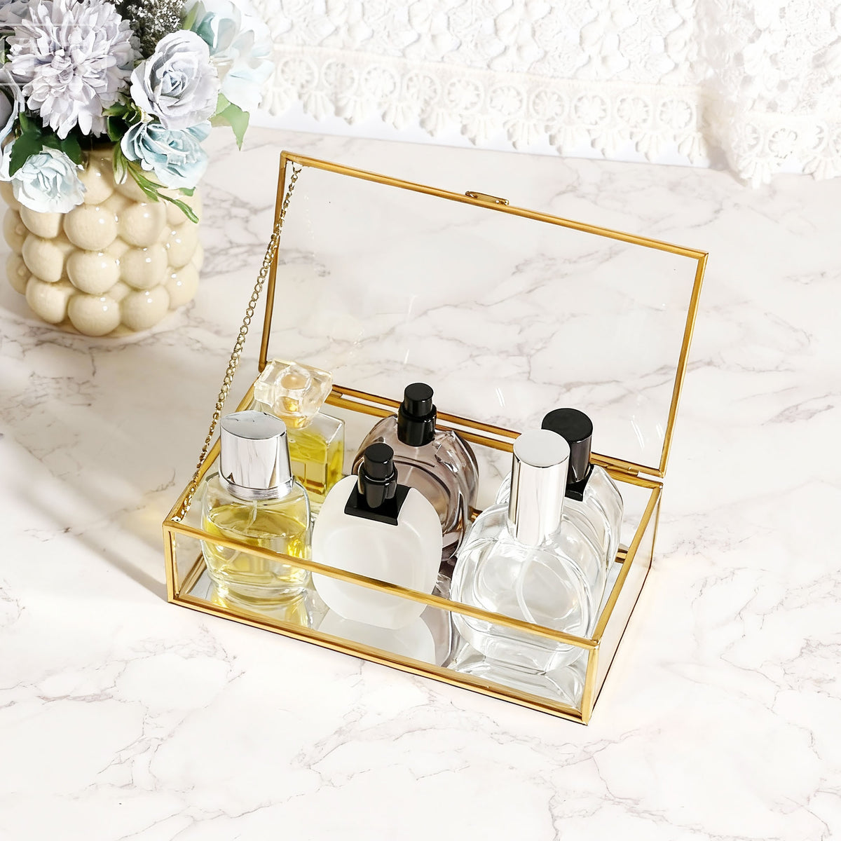 Gold Glass Jewelry Box with Perfume Bottles Creates a Refined Display Space for Personal Treasures