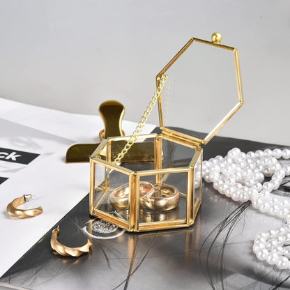Gold Glass Jewelry Box close-up featuring a chain-linked lid design that adds elegance and decorative appeal