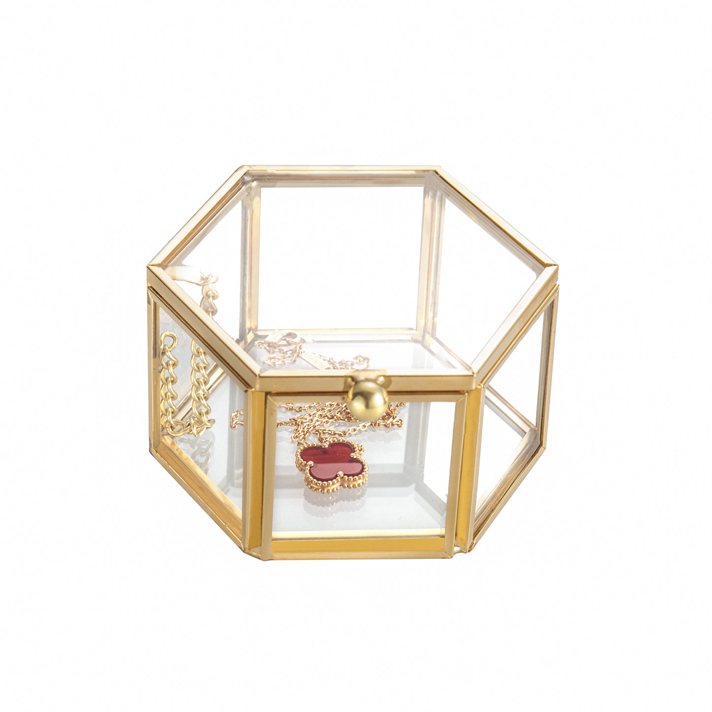 Feyarl Gold Glass Jewelry Box with hexagonal design for organizing rings, earrings, and small keepsakes in an elegant display