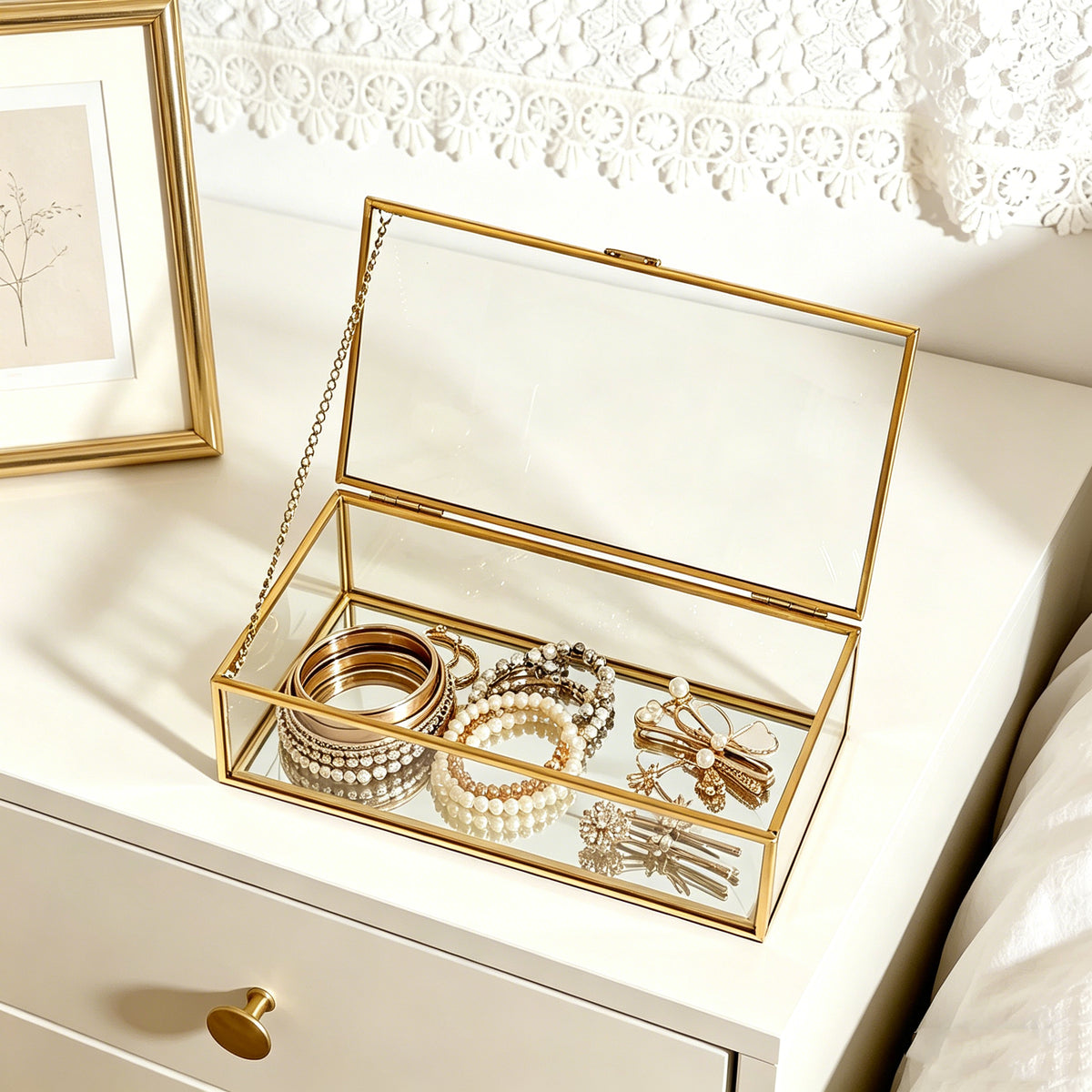 Gold Glass Jewelry Box Displaying Jewelry and Personal Treasures on a Bedside Table for Stylish Home Organization