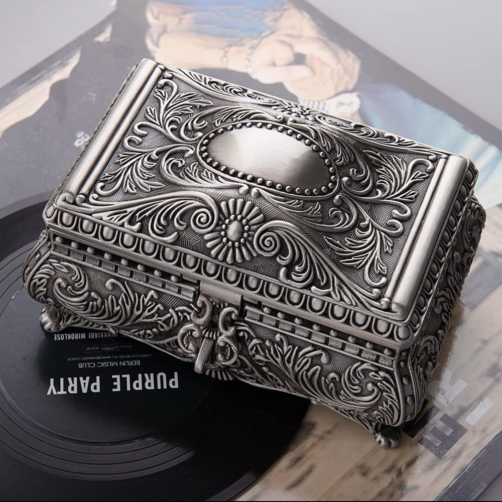 Vintage Jewelry Box Featuring a Polished Metallic Surface and Elegant Engraved Details for a Timeless Decorative Look