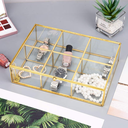Gold Glass Jewelry Trinket Box organizing everyday items in six compartments on a tabletop for neat storage
