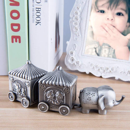 Feyarl Silver Elephant Keepsake Box Displayed Near a Baby Photo Frame with a Charming Design for Cherished Childhood Memories