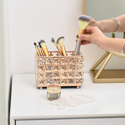 Gold Crystal Makeup Brush Holder on a vanity table with makeup brushes easily accessible for daily use