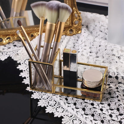 Versatile Gold Glass Organizer with makeup brushes and beauty items for an elegant vanity display