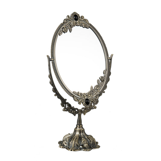 Feyarl Vintage Metal Makeup Mirror with double-sided oval swivel design and embossed frame for elegant vanity decor