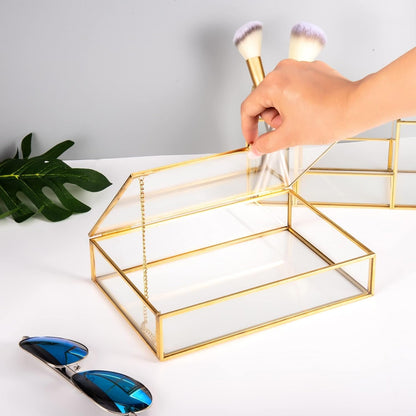 Vanity Organizer with an open lid design showcasing its elegant glass body and gold frame