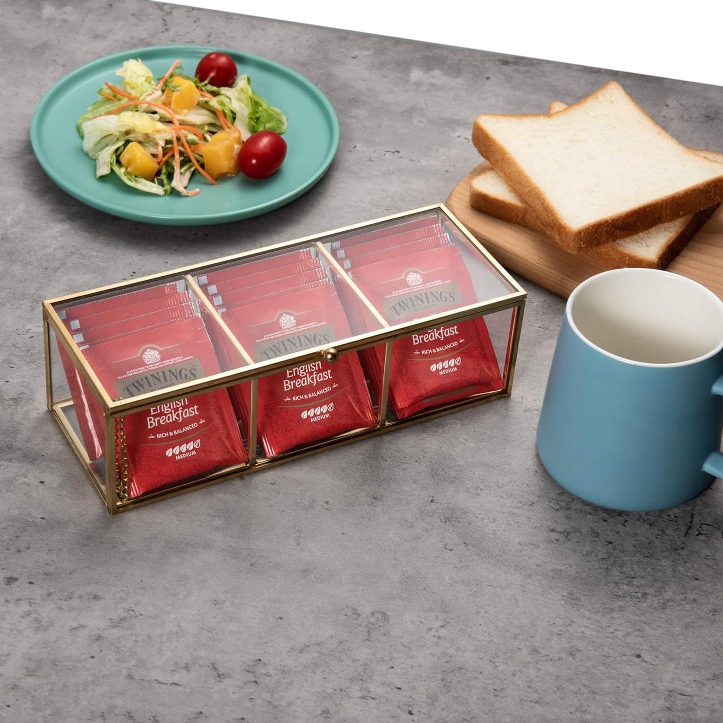 Gold Glass Storage Box with divided compartments organizing tea bags neatly for easy access and versatile storage