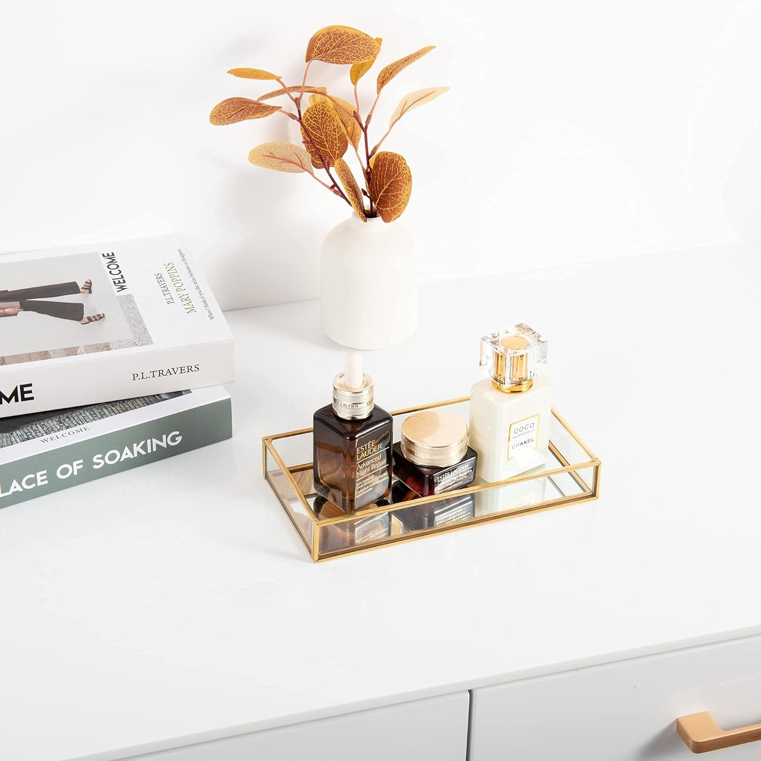 Feyarl gold edge clear glass vanity tray holding perfume bottles