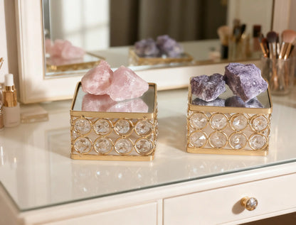 Display Pedestal presenting crystal pieces on a reflective surface for a sparkling decorative display