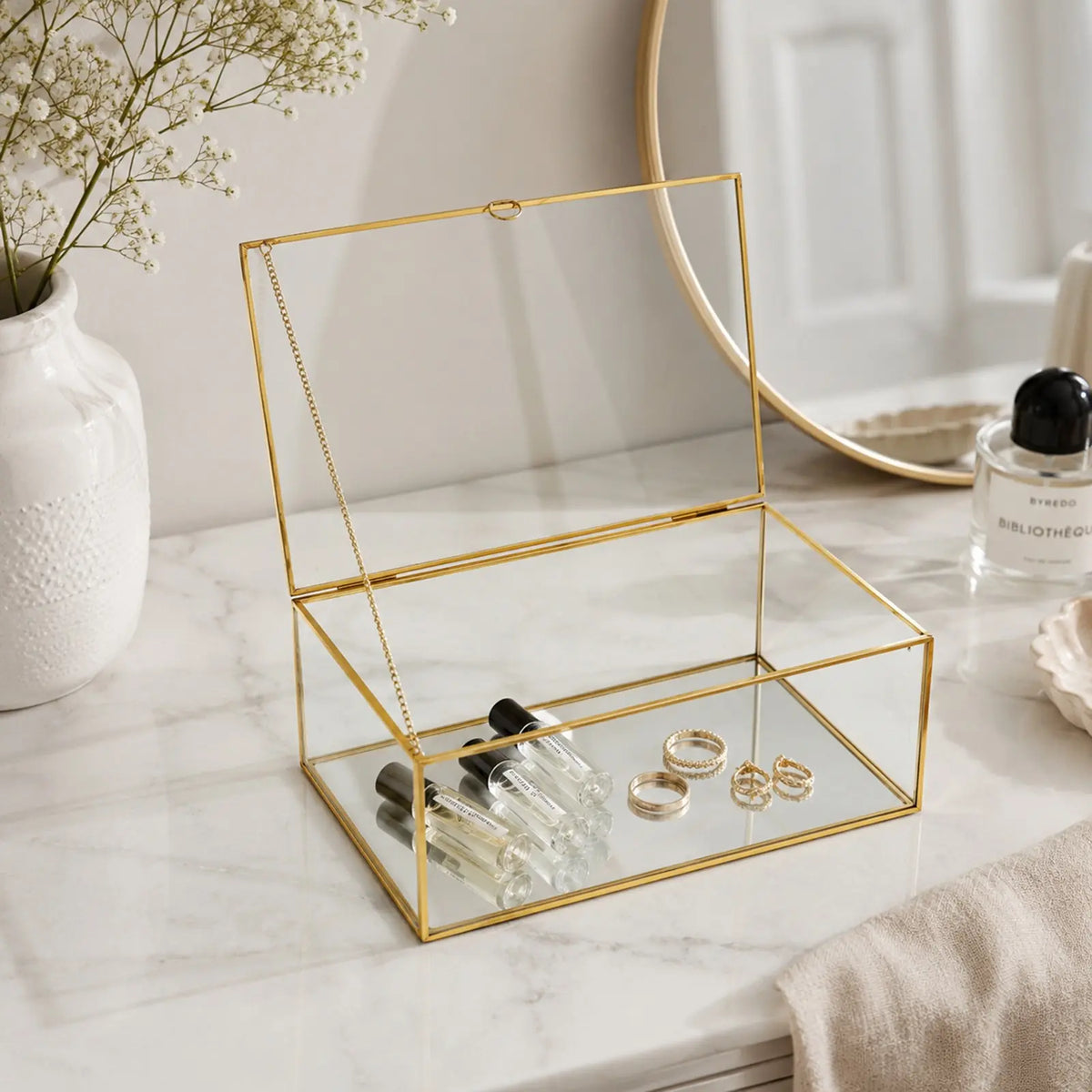 Keepsake Box displaying small decorative items and keepsakes with an elegant glass design
