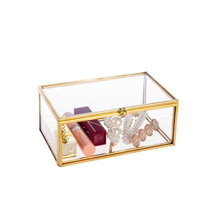 Gold Glass Storage Box with stored items showcasing its clear glass design and elegant gold frame