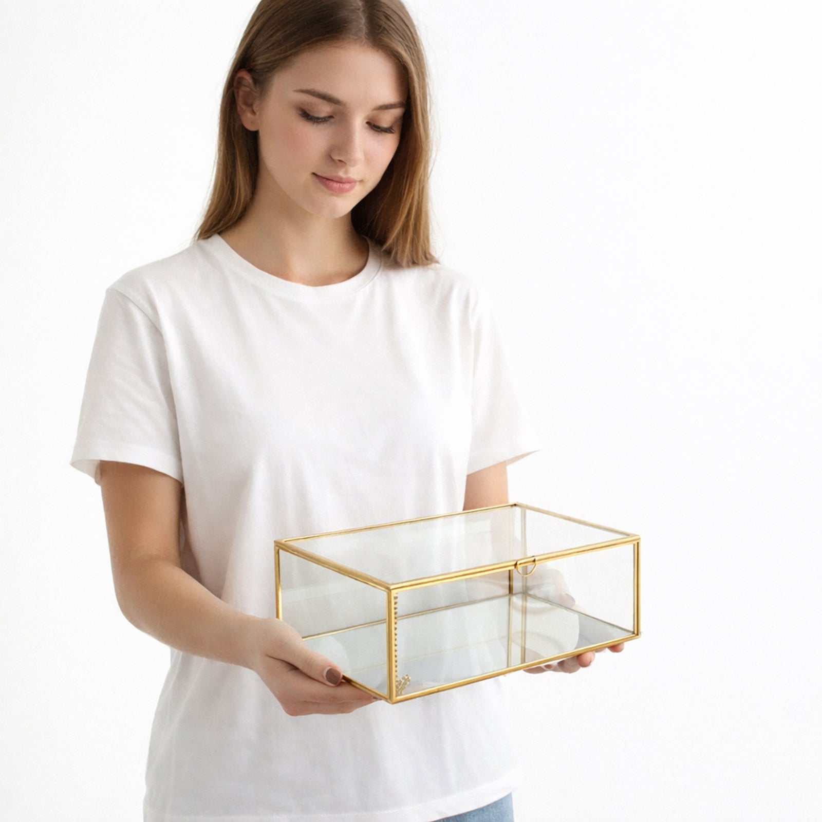 Elegant Gold Glass Makeup Organizer Box held in hand showcasing its transparent glass design