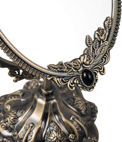 Antique-inspired decorative makeup mirror with floral detailing