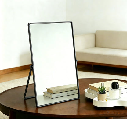 Black Tabletop Vanity Mirror Displayed on a Side Table as an Elegant Decorative Accent for Personal Spaces