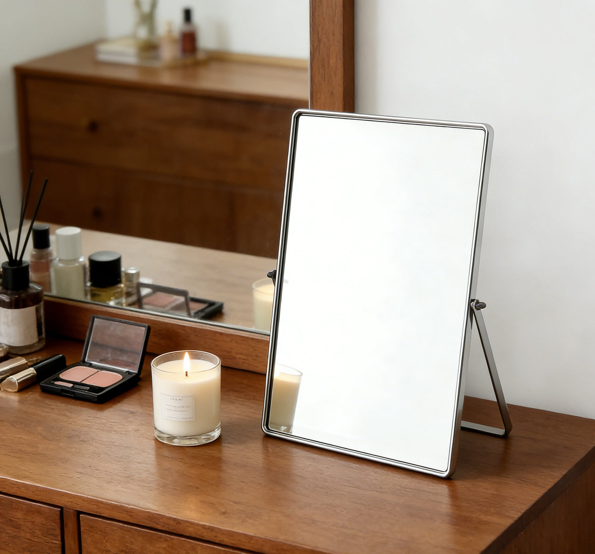 Desktop Makeup Vanity Mirror Placed on a Vanity Table with a Silver Frame for an Elegant Beauty Space