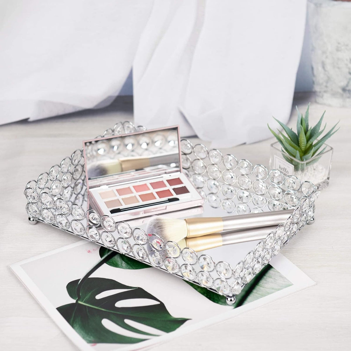 Crystal Vanity Tray displaying cosmetics and beauty essentials, creating an organized and elegant vanity space